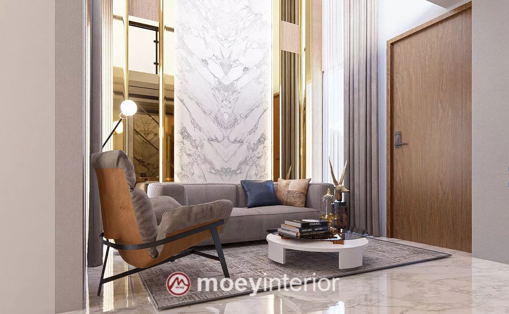 Ruang tamu depan dengan chandelier gold dan dinding marmer Bu Maya Enchante